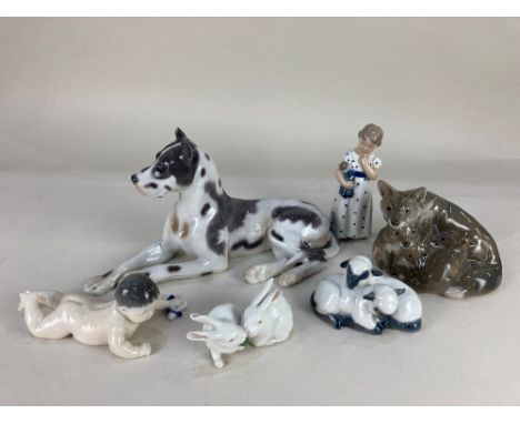 Three Royal Copenhagen porcelain models of animals, fox with cubs, a pair of rabbits and a pair of sheep, a B&amp;G porcelain