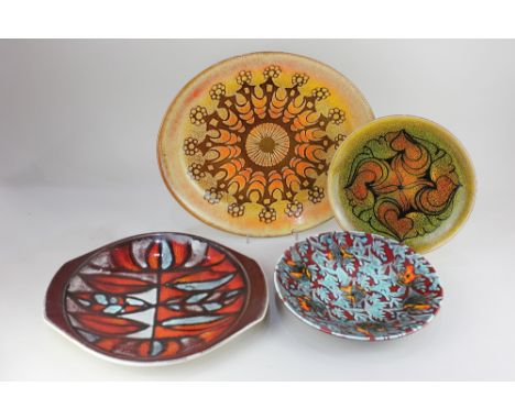 A Poole pottery Aegean oval dish and plate, each decorated with a linear pattern on speckled ground, largest 39.5cm, together