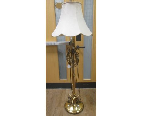 An Edwardian brass standard lamp  