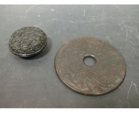 A Chinese zitan black seal paste box, the cover with relief butterflies and flowers, 8.5cm diameter together with a Chinese l