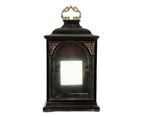 AN 18TH CENTURY EBONISED BRACKET CLOCK CASE with folding brass carrying handle and inverted bell top, for a 7" wide movement.