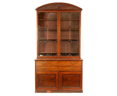 A GOOD MID 18TH CENTURY COUNTRY HOUSE MAHOGANY SECRETAIRE BOOKCASE IN THE MANNER OF GILLOWS with arched leaf carved pediment 