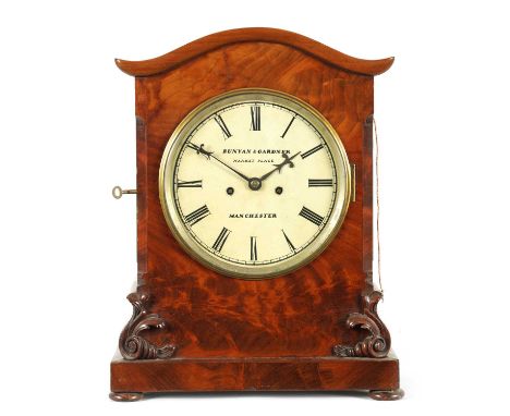 BUNYAN &amp; GARDENER, MANCHESTER. A MID 19TH CENTURY FIGURED MAHOGANY BRACKET CLOCK with shaped moulded top above canted cor