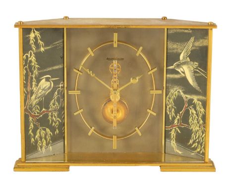 JAEGER-LECOULTRE. A MID 20TH CENTURY SWISS MANTEL CLOCK the gilt brass case with glazed front enclosing an oval chapter ring 