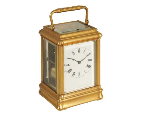 A LATE 19TH CENTURY FRENCH GILT BRASS GORGE-CASED REPEATING CARRIAGE CLOCK the white enamel dial with Roman chapter ring fron