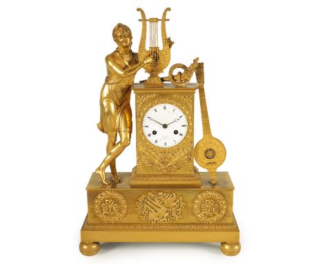 KINABLE, PALAIS ROYAL, NO. 131. AN EARLY 19TH CENTURY FRENCH ORMOLU FIGURAL MANTEL CLOCK modelled as Orpheus playing a lyre s