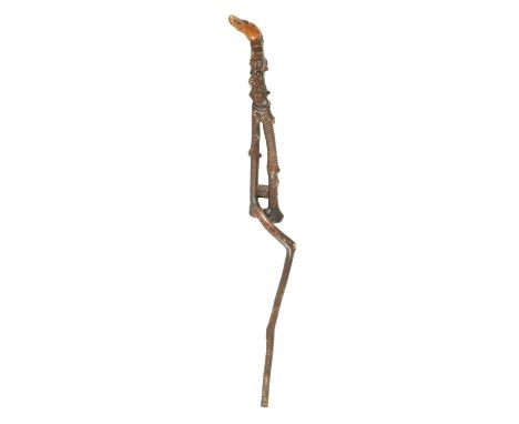 A RARE 19TH CENTURY FOLK ART CARVED FRUITWOOD WALKING STICK with acorn and oak leaf carved decoration and slender dogs head h