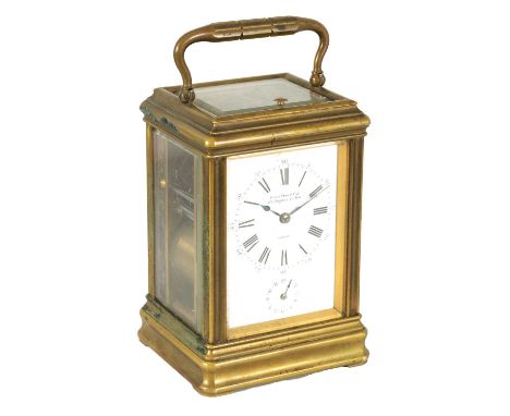 DROCOURT, PARIS. A LATE 19TH CENTURY GRANDE SONNERIE GORGE CASED BRASS REPEATING CARRIAGE CLCOK the white enamel dial with Ro