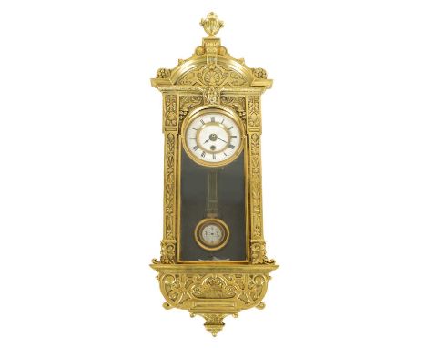 A 19TH CENTURY MINIATURE BRASS AND EBONISED VIENNA STYLE WALL CLOCK the case with relief work brass glazed door and pediment 