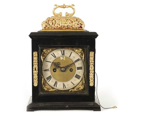 EDMUND APPLY, AT CHARING CROSS. A WILLIAM AND MARY EBONY VENEERED GILT BRASS MOUNTED BASKET TOP BRACKET CLOCK the gilt emboss