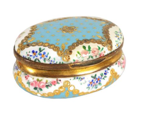 AN 18TH CENTURY LIMOGES ENAMEL PORCELAIN PATCH BOX with handpainted floral decoration and gold foil stars, on a pale blue gro