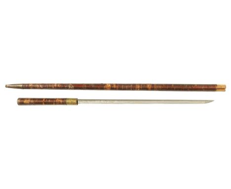 A RARE MEIJI PERIOD JAPANESE SAMURAI SWORD STICK with lacquered stick, the handle enclosing a glazed mother-of-pearl compass,