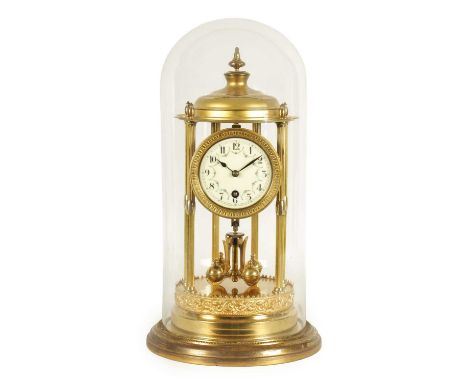 AN EARLY 20TH CENTURY 'BANDSTAND' 400-DAY TORSION CLOCK with domed top and reeded pillars on circular base, the floral enamel