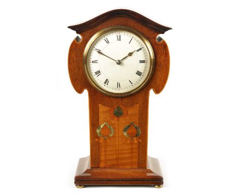 AN EDWARDIAN ART NOUVEAU STYLE BOXWOOD STRUNG AND MAHOGANY INLAID MANTEL CLOCK the enamel Roman dial fronting an eight-day sp