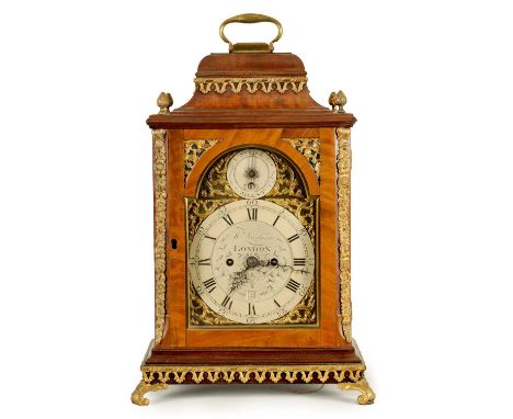 M. NICOLASON, LONDON. A GEORGE III FIGURED MAHOGANY ORMOLU MOUNTED INVERTED BELL TOP EIGHT-DAY BRACKET CLOCK the 7" arched br