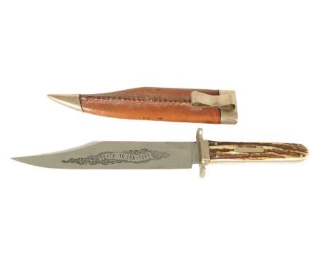A 20TH CENTURY STAG HORN HANDLED BOWIE KNIFE nickel mounts and steel blade etched "DEATH TO TRAITORS" in nickel mounted leath