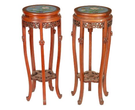 A PAIR OF LATE 19TH/EARLY 20TH CENTURY HARDWOOD CHINESE JARDINIERE STANDS WITH CLOISONNÉ ENAMEL TOPS depicting flower sprays 