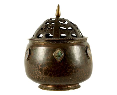 AN ARTS AND CRAFTS ARTISTS GUILD PLANISHED COPPER POT-POURI BOWL AND COVER the footed rounded body set with lozenge shaped ab