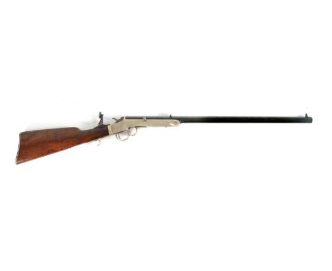 A 19TH CENTURY FRANK WESSON BREECH-LOADING TWO-TRIGGER RIMFIRE RIFLE having a blued octagonal barrel with folding sights sign