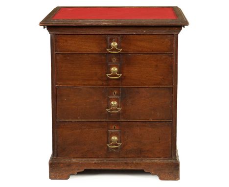 AN UNUSUAL LATE 19TH CENTURY WALNUT SMALL CHEST OF DRAWERS BY E. WALKER CABINETMAKER AND DATED 1893. the moulded edge recesse