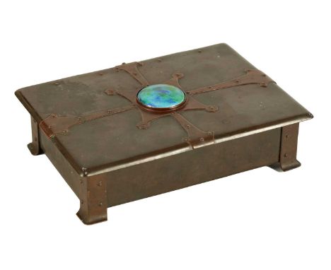 AN ARTS AND CRAFTS PATINATED COPPER CIGARETTE BOX IN THE MANNER OFJESSON, BIRKETT &amp; CO. of rectangular form with riveted 