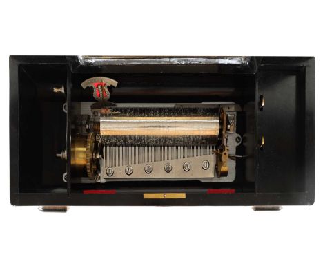 A LATE 19TH CENTURY SWISS SIX AIRS CYLINDER MUSIC BOX the rosewood case inlaid with holly and maple having a hinged lid openi