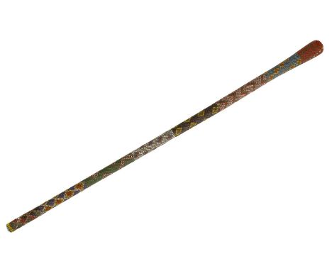 A LATE 19TH CENTURY ZULU COLOURED BEADWORK WALKING CANE decorated multi geometric panels.65cm overall It has come from a priv