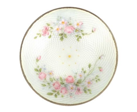 A GEORGE V SILVER AND GUILLOCHE ENAMEL TRINKET DISH decorated with floral sprays on a spiralling white ground, import marks f