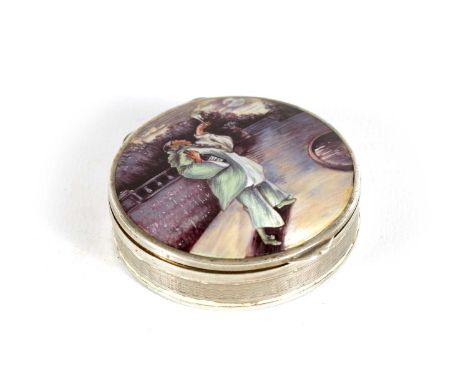 AN GEORGE V FRENCH ENGINE TURNED AND SILVER ENAMEL CIRCULAR BOX with figural scene to the lid. London import mark 1927 by Geo