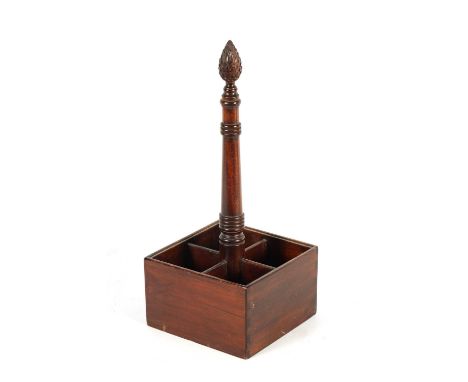 A 19TH CENTURY MAHOGANY DECANTER STAND with pineapple finial and ring turned stem, above a four divisional square base.20cm s