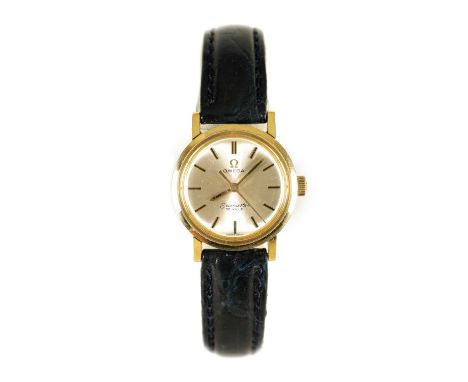 A LADIES SEAMASTER DE VILLE MANUAL WIND WRISTWATCH with silvered dial and applied numerals on a leather strap23cm diameter