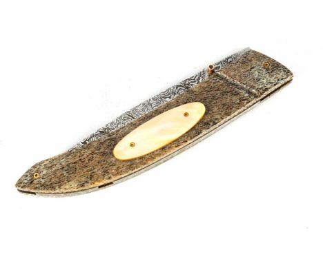 A GOOD QUALITY FOLDING KNIFE WITH MAMMOTH RIB HANDLE the knife by Johan Gustafsson has a locking Damascus blade with a single