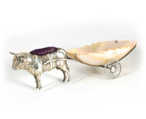 AN UNUSUAL EDWARD VII SILVER AND MOTHER OF PEARL PIN CUSHION modelled as an Ox pulling a cart - hallmarked Birmingham 1908 by
