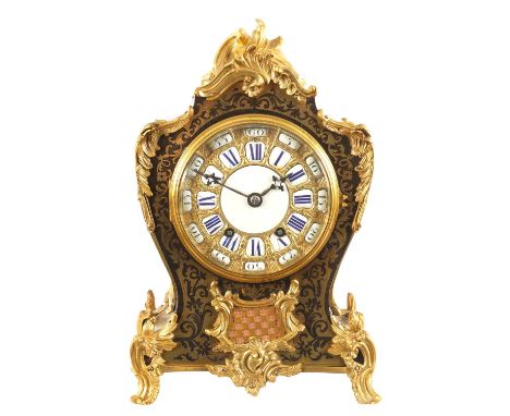 A LATE 19TH CENTURY FRENCH BOULLE AND ORMOLU MANTEL CLOCK the tortoiseshell and brass inlaid case with rococo style mounts en