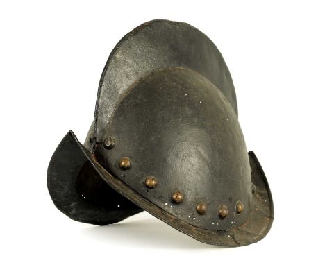 A 19TH CENTURY SPANISH COMB MORION BOAT STLYE HELMET with shaped rim and riveted edge.31cm wide 22cm wide 27cm high