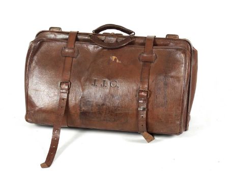 A LARGE VINTAGE BROWN LEATHER GLADSTONE BAG with double catch and leather straps 65cm wide