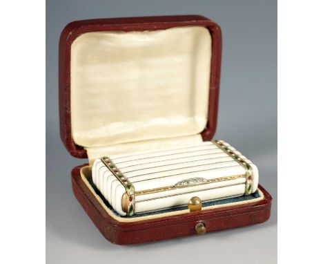 AN EARLY 20TH CENTURY FABERGE SILVER GILT AND ENAMEL VESTA CASE, WORKMASTER HENRIK WIGSTROM having a fluted white enamel desi
