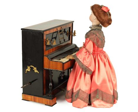 A RARE 19TH CENTURY FRENCH AUTOMATON MUSIC BOX formed as a young lady playing an upright piano, the ebonised and ivory kingwo