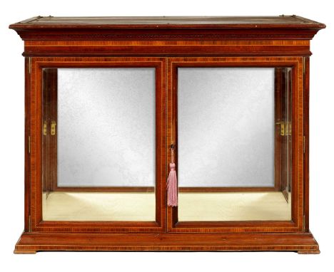 AN EARLY 20TH CENTURY FRENCH TABLE TOP MAHOGANY AND KINGWOOD CROSSBANDED DISPLAY CABINET with bevelled glass doors and sides 