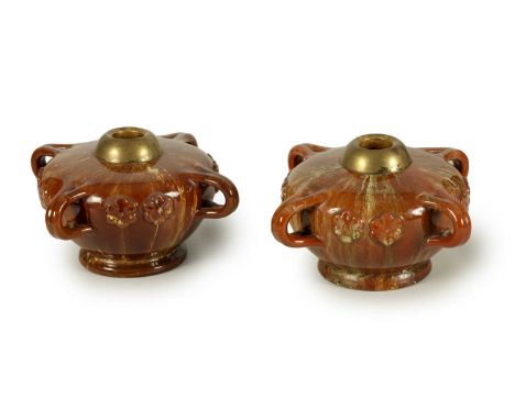 A PAIR OF LATE 19TH CENTURY LINTHORPE LAMP BASES IN THE MANNER OF CHRISTOPHER DRESSER of squat footed form with brass mounts,