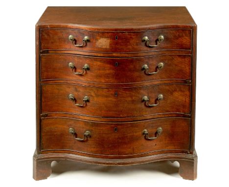 A GOOD GEORGE III FIGURED MAHOGANY SERPENTINE CADDY TOP CHEST OF DRAWERS with caddy moulded edge top above four graduated dra