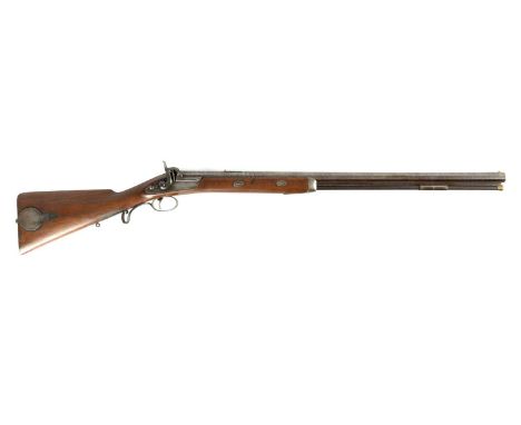 THOMAS BAKER, FLEET STREET, LONDON. A MID 19TH CENTURY 13 BORE BIG GAME PERCUSSION RIFLE with original browned twist octagona