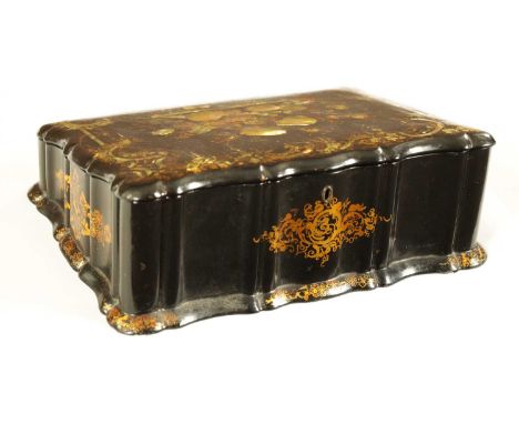 A 19TH CENTURY PAPIER MACHE AND MOTHER OF PEARL INLAID WRITING BOX with gilt and painted decoration, the angled hinged fall r