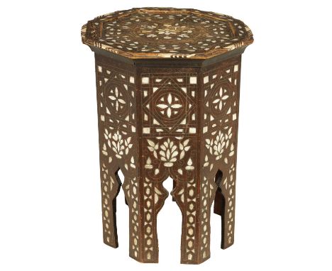 A 19TH CENTURY BONE AND MOTHER OF PEARL INLAID OCCASIONAL TABLE of octagonal shape with arched cut out sides37cm wilde 50cm h