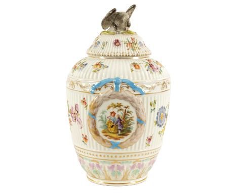 A LATE 19TH CENTURY DRESDEN LARGE VASE AND COVER IN THE MANNER OF AUGUSTUS REX of ribbed form with eagle finial, hand painted