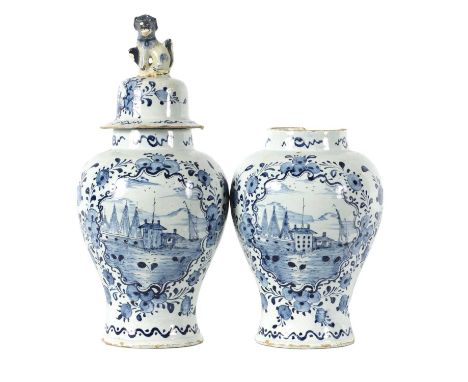 A PAIR OF 18TH CENTURY BLUE AND WHITE DELFT VASES AND COVER the inverted baluster bodies decorated with harbour scenes within