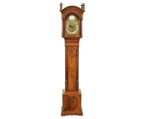 AN EARLY 20TH CENTURY CHIPPENDALE STYLE MAHOGANY THREE TRAIN QUARTER STRIKING GRANDMOTHER CLOCK the brass arched dial with ma