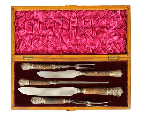 A LATE 19TH CENTURY BOXED SILVER MOUNTED STAG HORN CARVING SET the inlaid oak case with velvet and silk interior enclosing tw