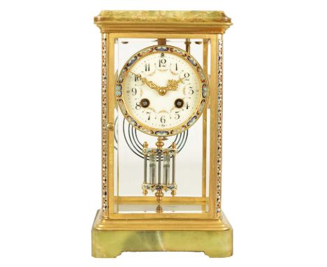 A LATE 19TH CENTURY FRENCH CHAMPLEVE ENAMEL, ONYX AND BRASS FOUR GLASS MANTEL CLOCK the glazed case with champleve enamel fra