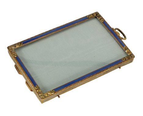 A 19TH CENTURY FRENCH GILT BRASS AND BLUE GUILLOCHE ENAMEL PICTURE FRAME OF SMALL SIZE with flower head embossed corners and 